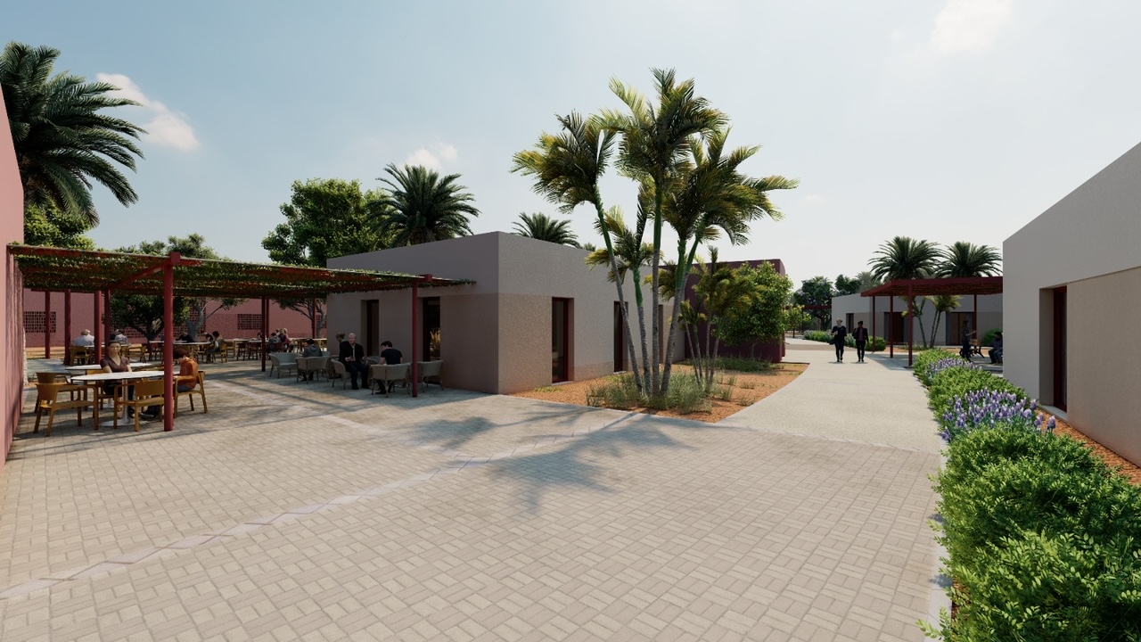 Plaza entre bungalós con pérgola y palmeras en El Algar